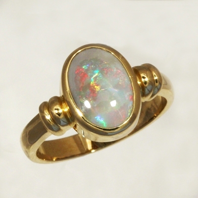 CUSTOM MADE 18k Yellow Gold Ring with a SOLID SEMI BLACK OPAL Rolling flashes of red to blue to green 